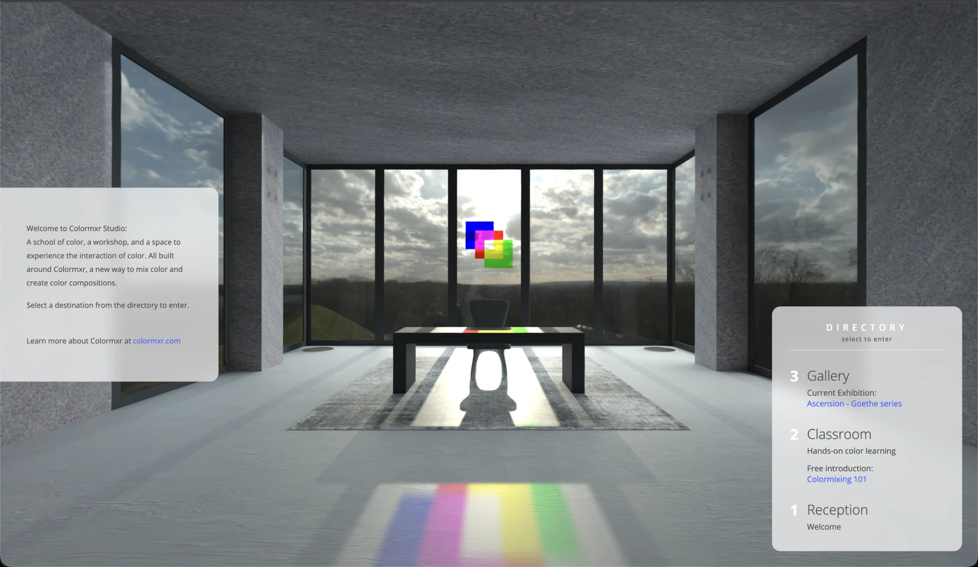 Colormxr Studio reception: a room with tall windows, a desk, and a directory panel